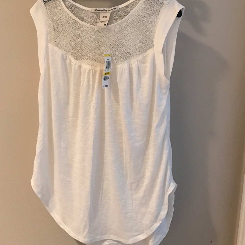 Cute sleeveless summer shirt! Never worn