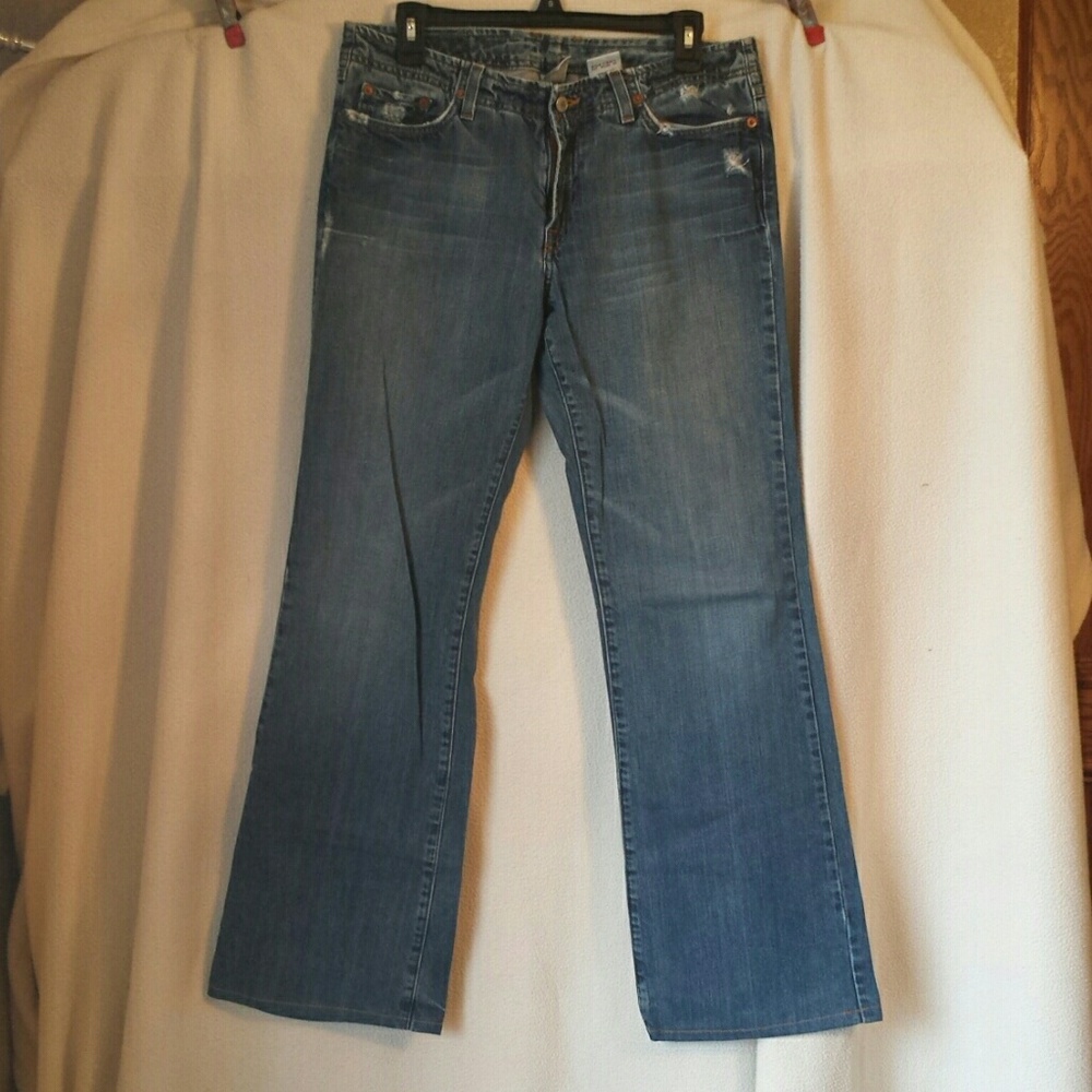 Distressed Lucky brand blue jeans