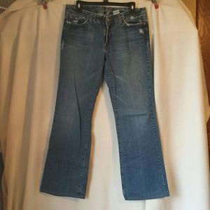 Distressed Lucky brand blue jeans