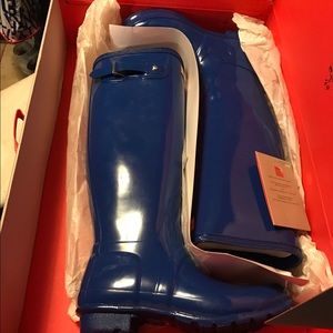 Brand new in box blue Hunters, gloss finish,size 8