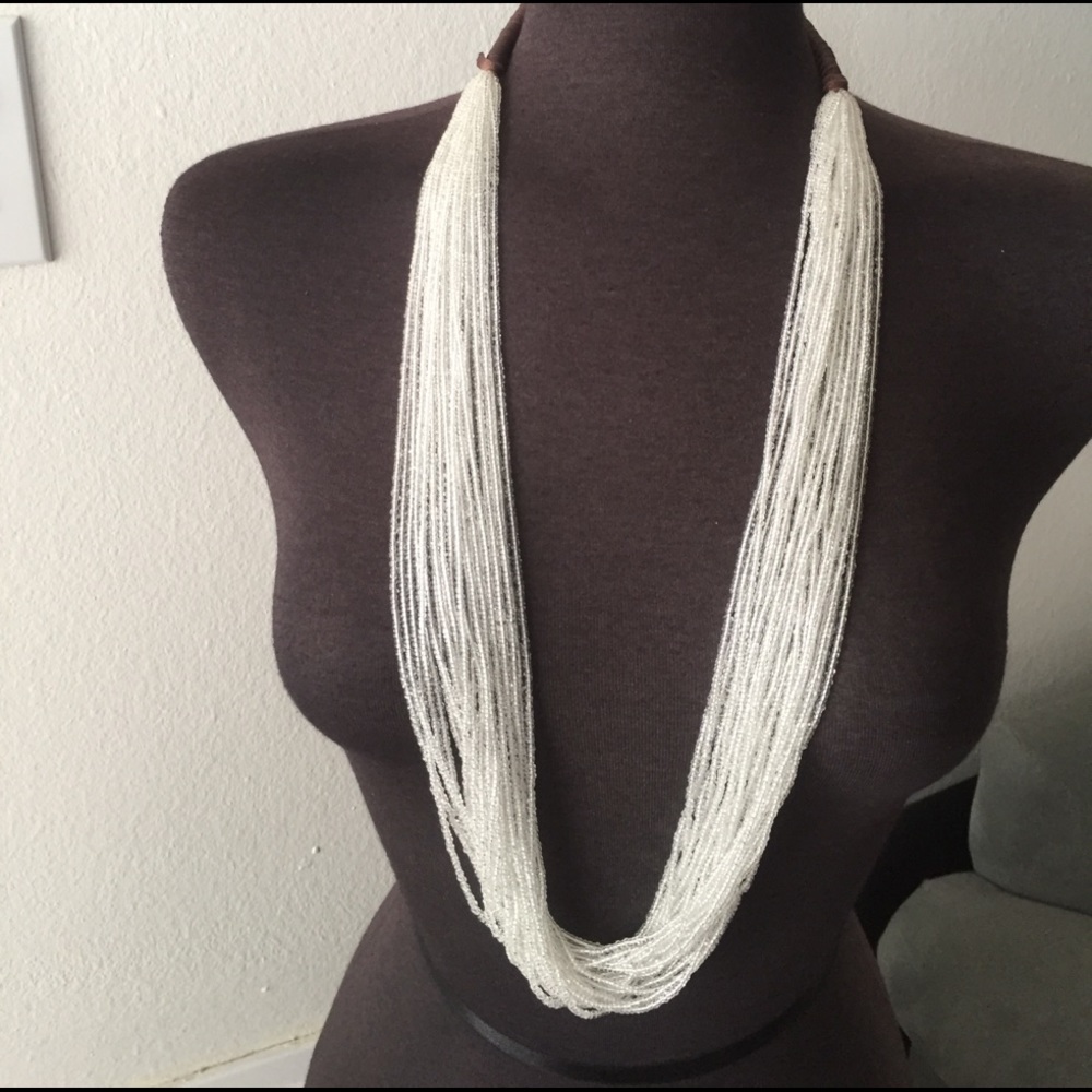 Beaded necklace multi strand with clear seed beads