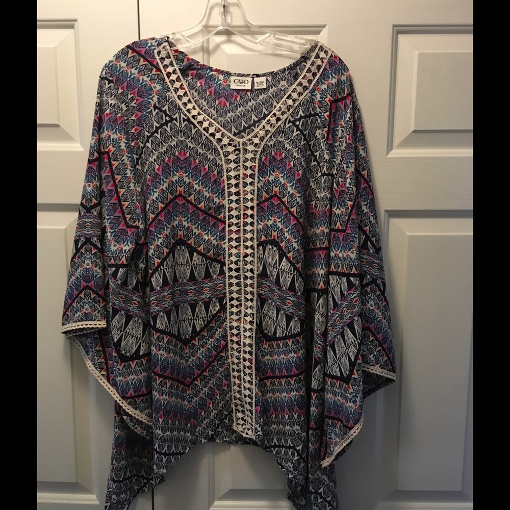 Multi-Colored Blouse. Beautiful Hemline Accent.