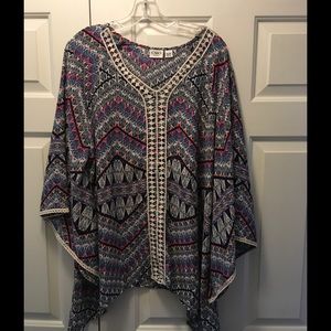 Multi-Colored Blouse. Beautiful Hemline Accent.