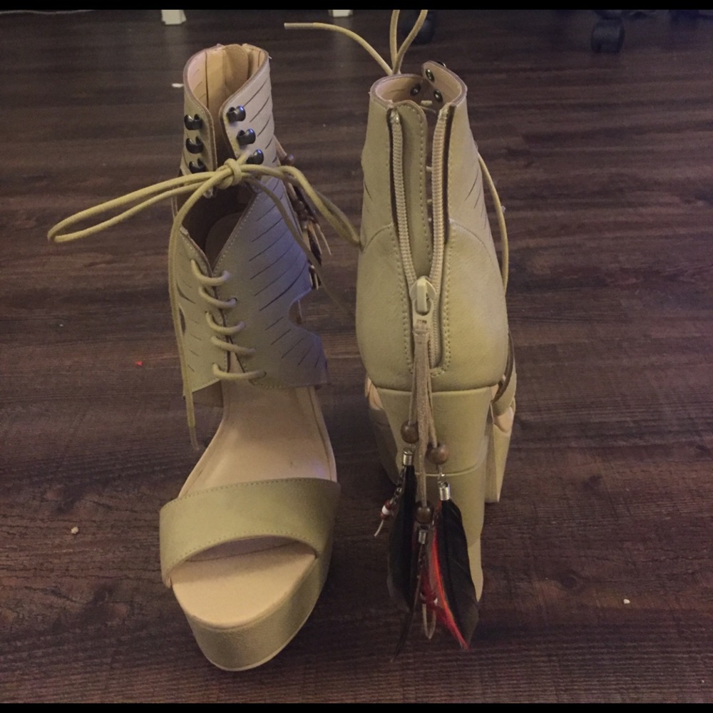 Nude platforms with feather zipper size 8.5