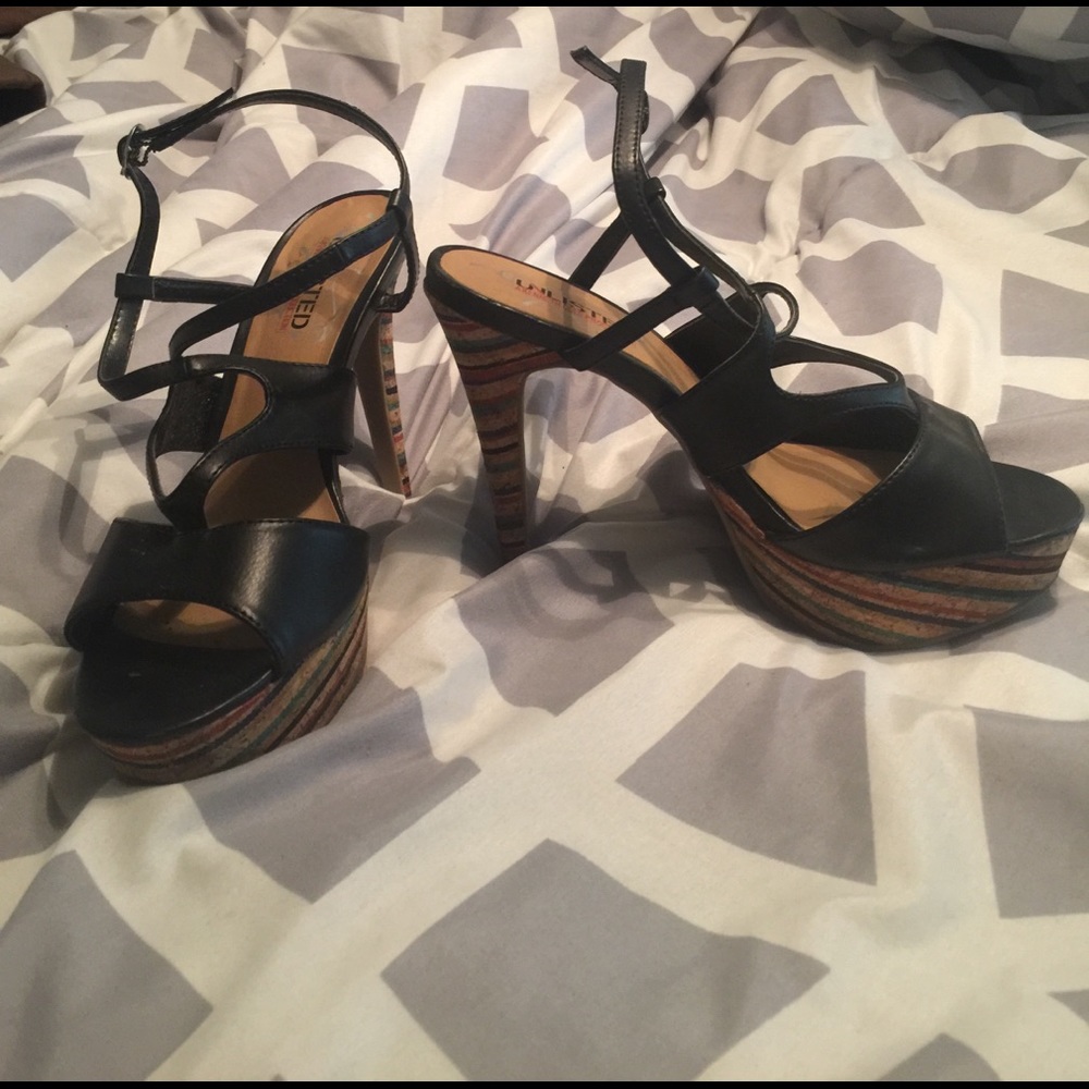 Hot black corkscrew strappy heels.