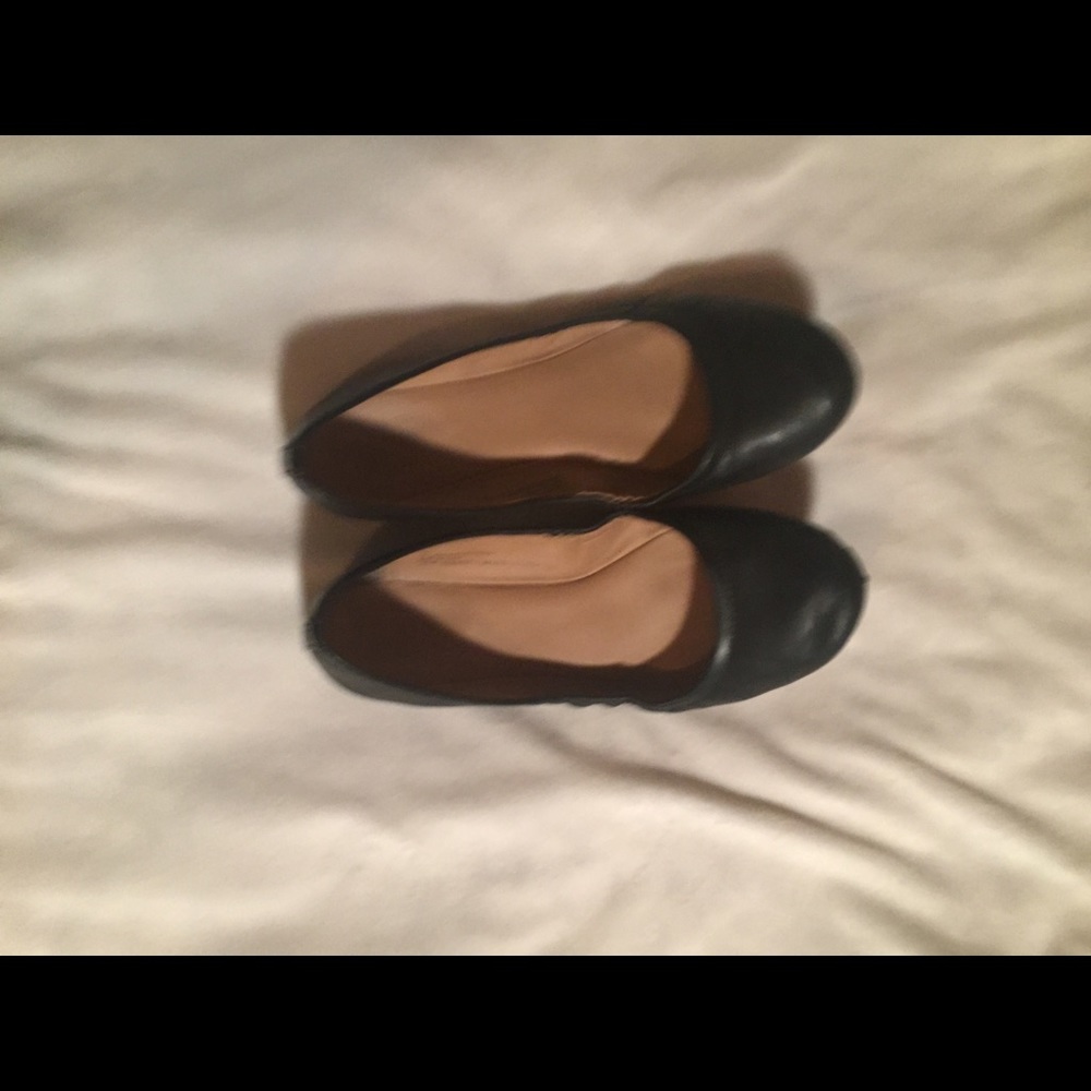 Plain black flats