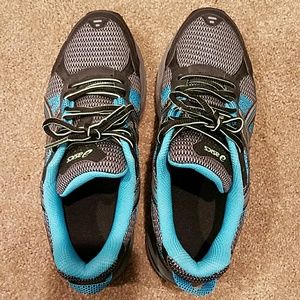 Women's ASICS sneakers.