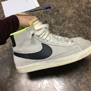 Light grey suede Nike high top throwback sneakers