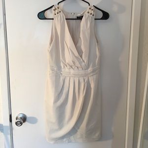 Women's short white dress with studs