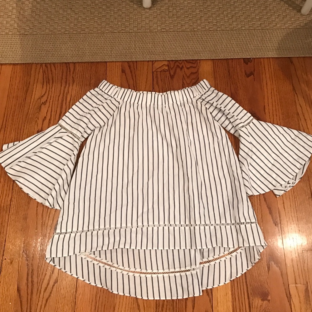 Never worn off the shoulder top. From revolve