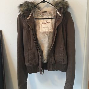 Fur hooded jacket with fur lining on inside