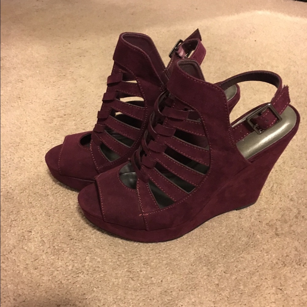 Wine colored wedges. Never worn