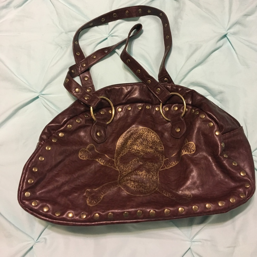 Brown handbag w/gold accents.