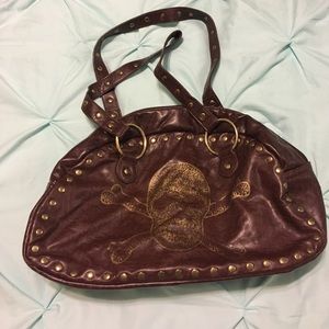 Brown handbag w/gold accents.