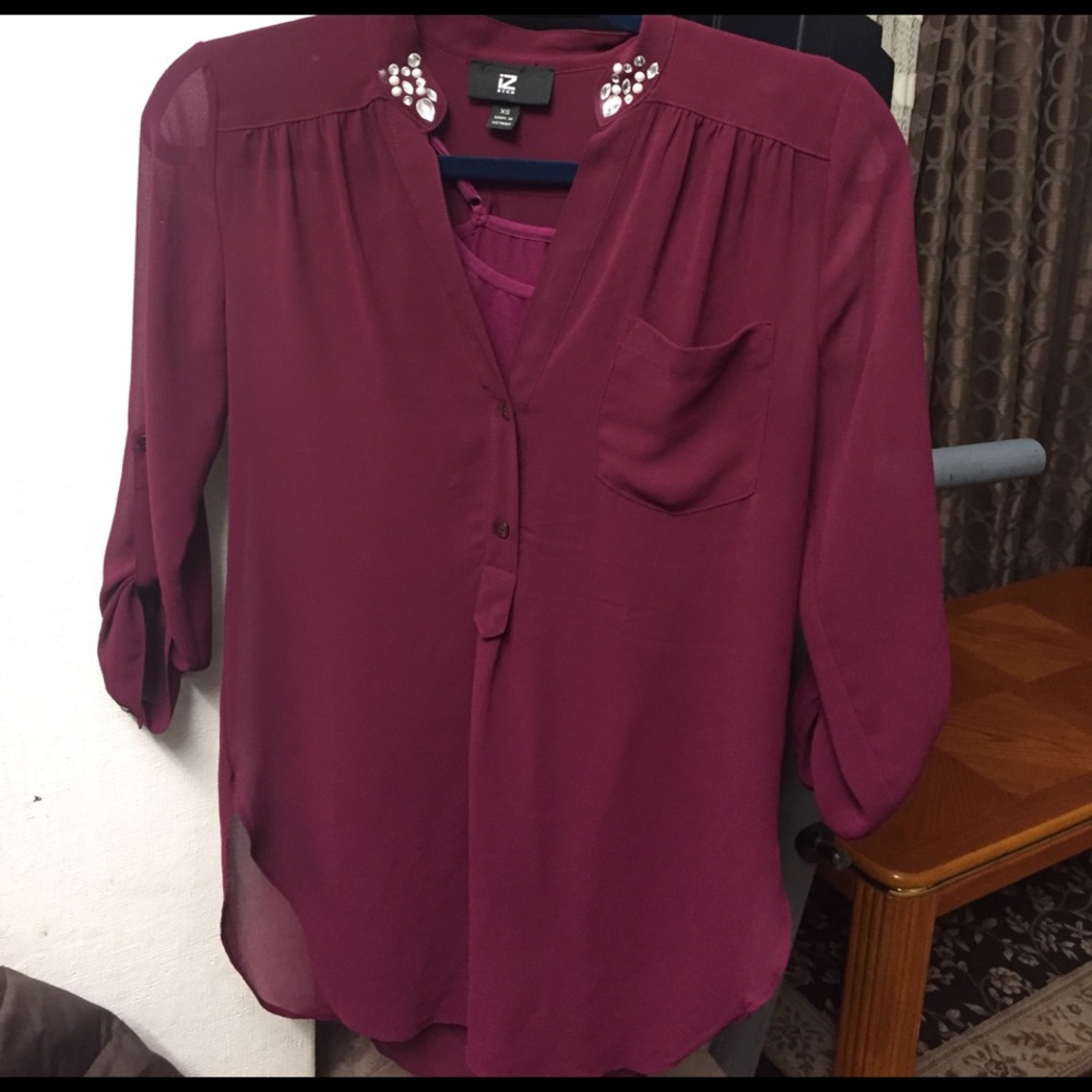 A preowned blouse worn twice