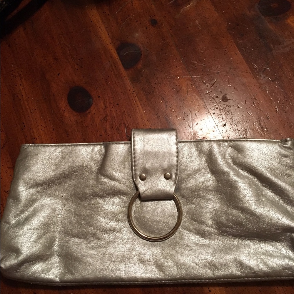Metallic silver clutch