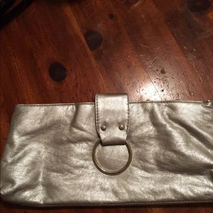 Metallic silver clutch