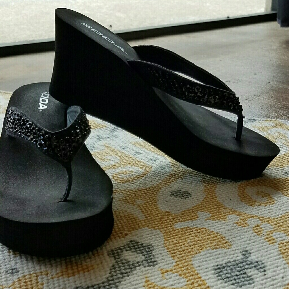 Black wedge flip flops
