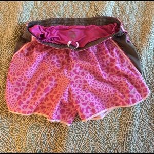 Nike running shorts leopard print size large