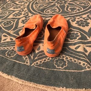 Bright mango colored Toms