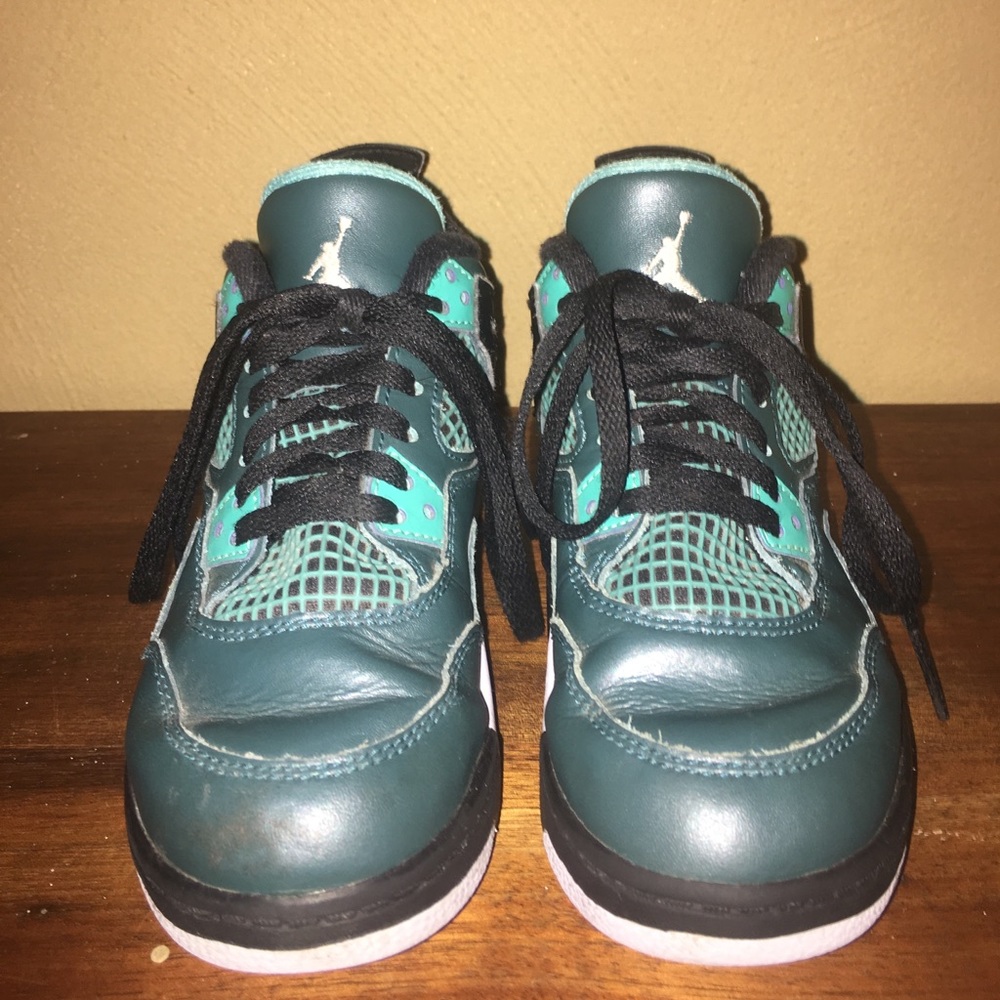 Kids size 12 retro air Jordan teal 4s.