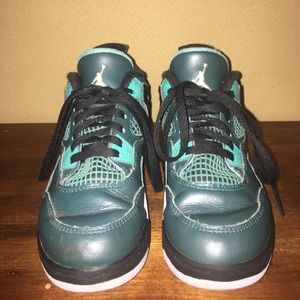 Kids size 12 retro air Jordan teal 4s.