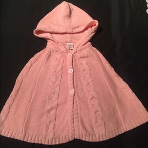 Pink poncho for girls.