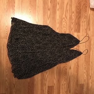 Black polka dot open back flare dress