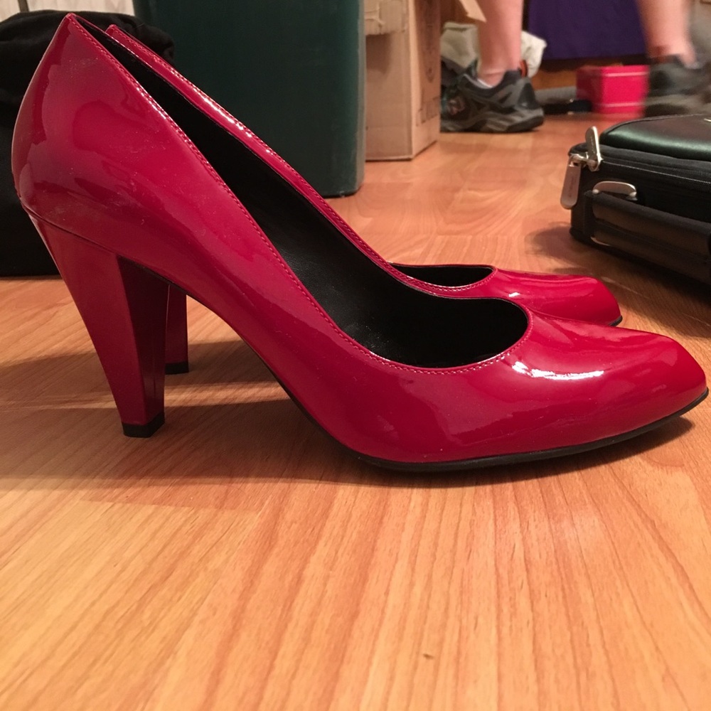 Red heels, never worn