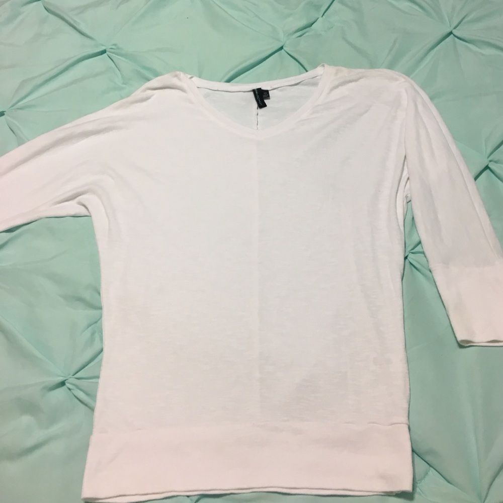 White 3/4 sleeve shirt..