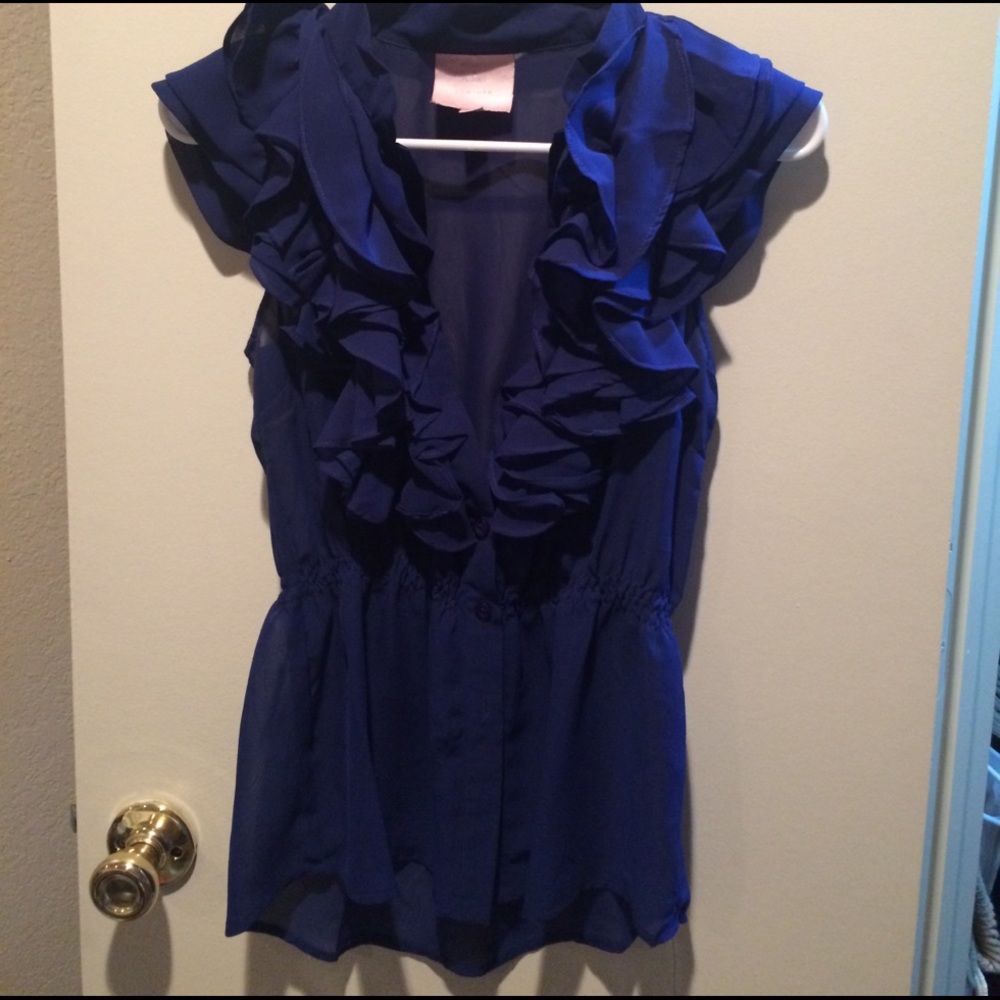 Sheer blue blouse with ruffles