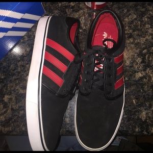Red and black adidas
