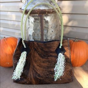 Cowhide and leather Purses
