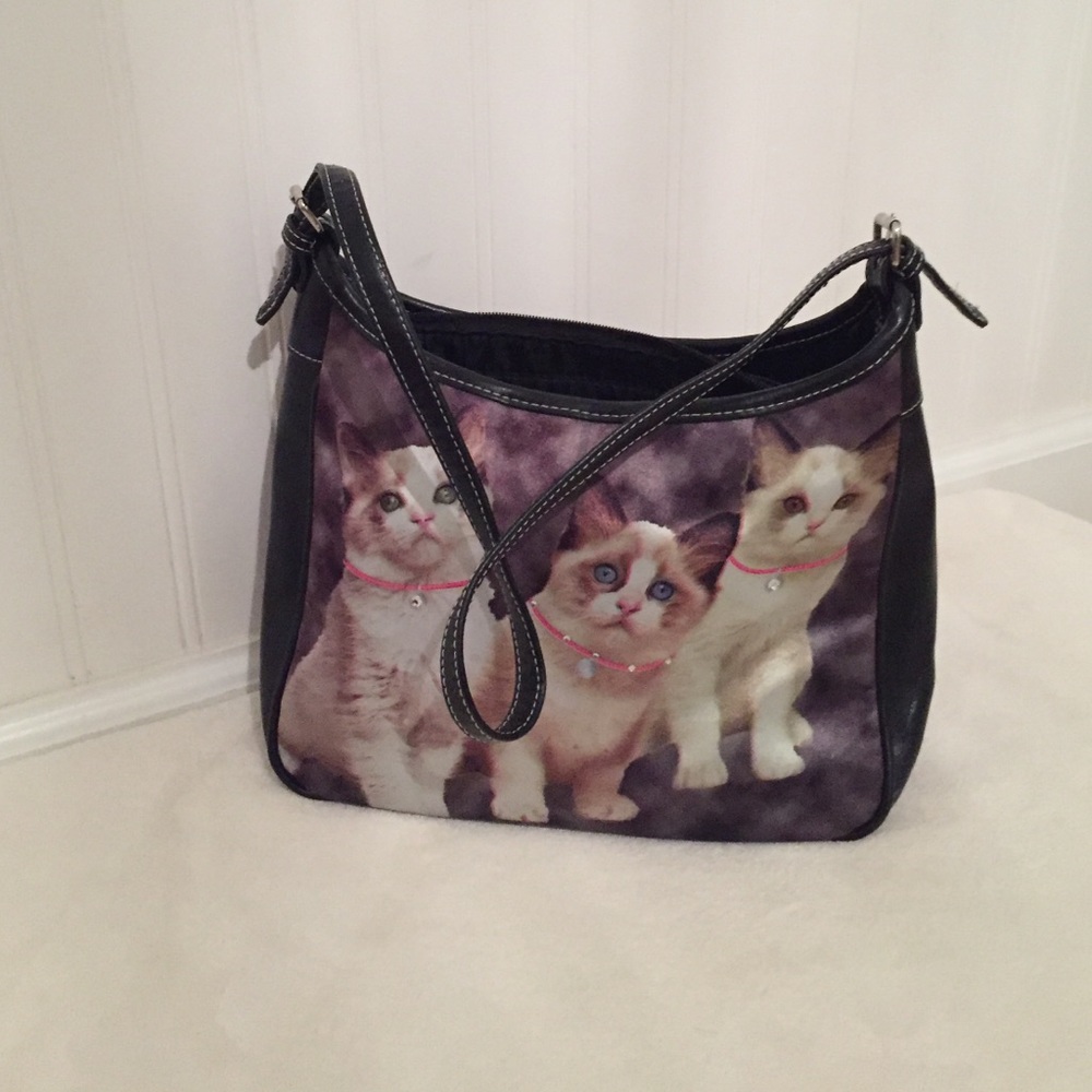 Purse with cats on it