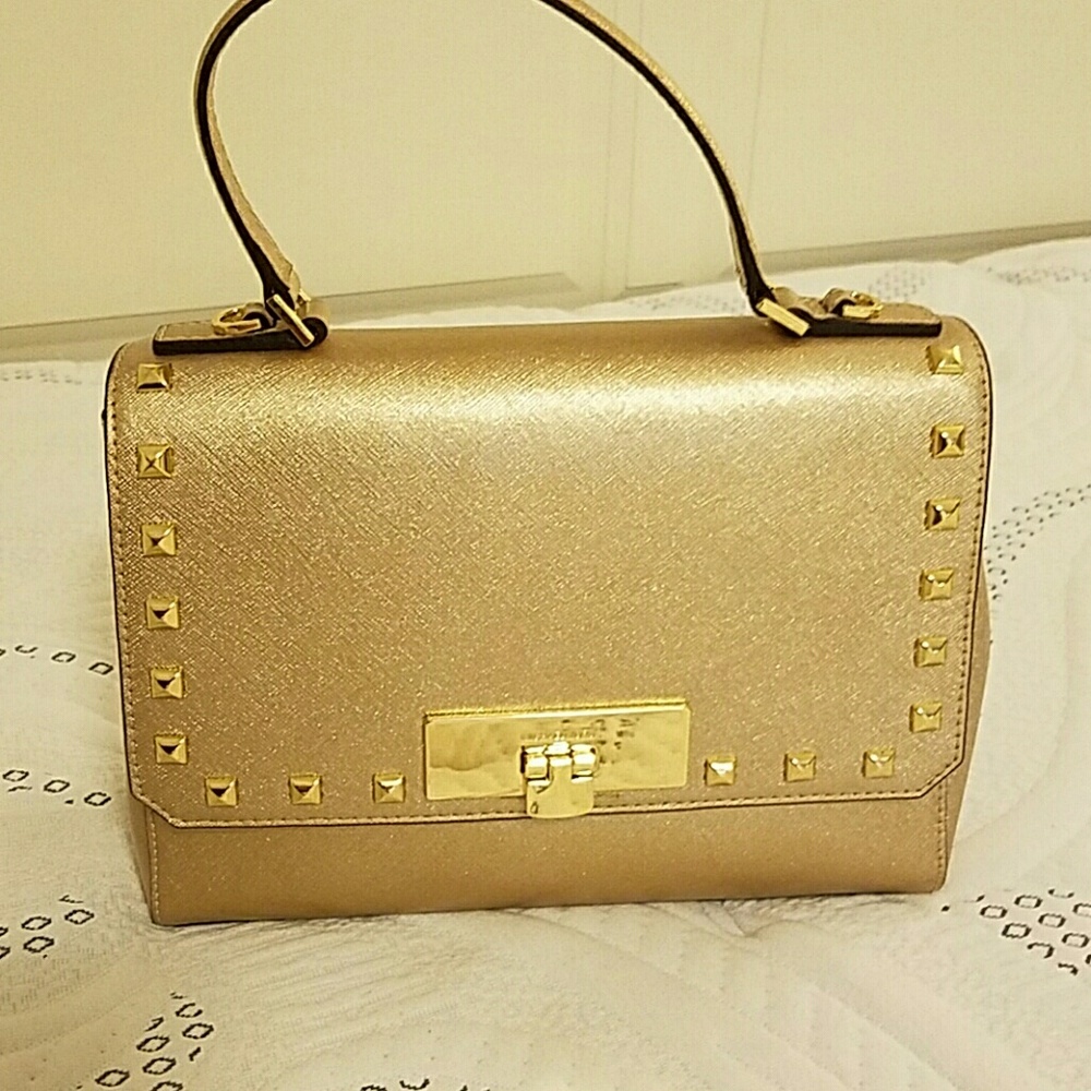 Gold purse by MK