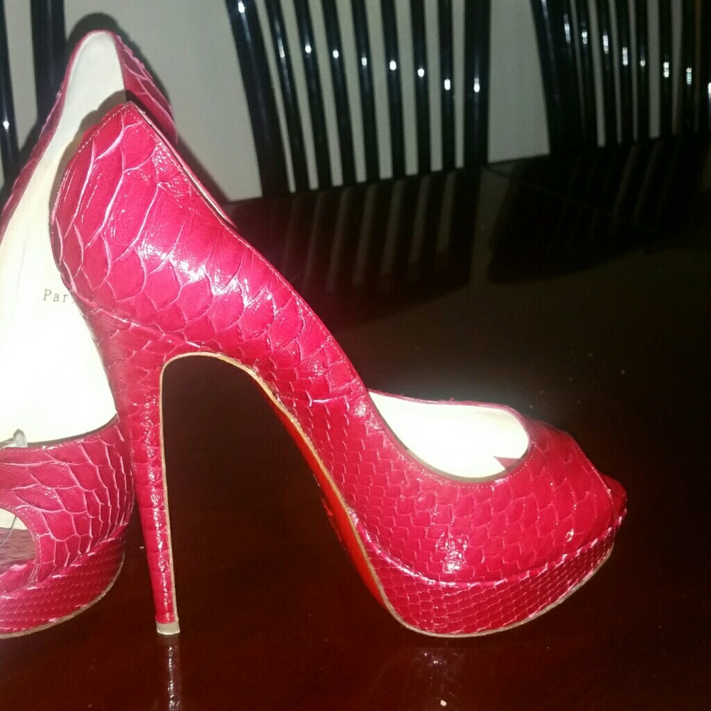Christian Louboutin pink snake skin