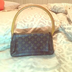 Vintage Louis Vuitton small looping bag.
