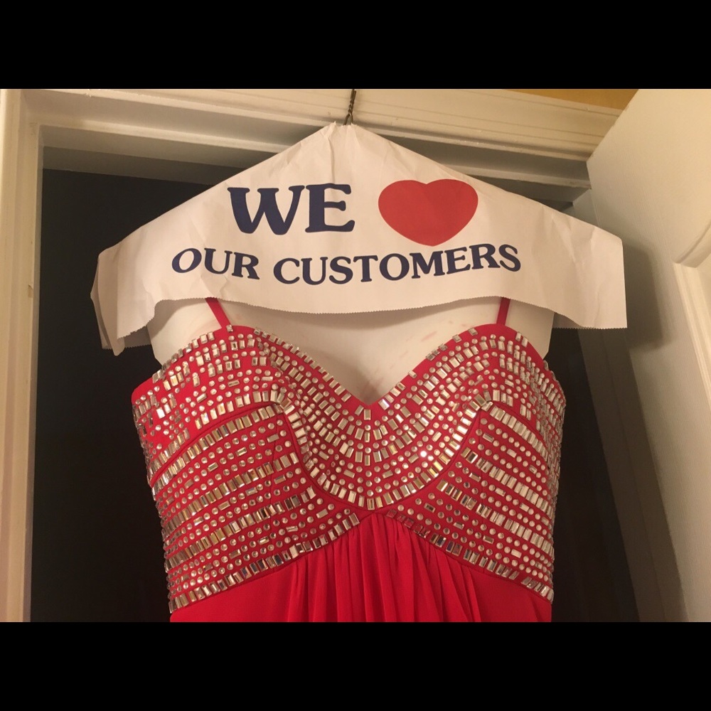 Red and silver strapless ball gown