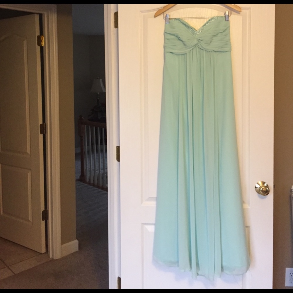 Floor length mint bridesmaid/prom dress.