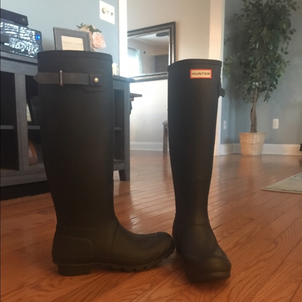 Tall black hunter boots