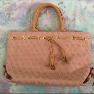 Light pink Dooney & Bourke tote bag with tassel