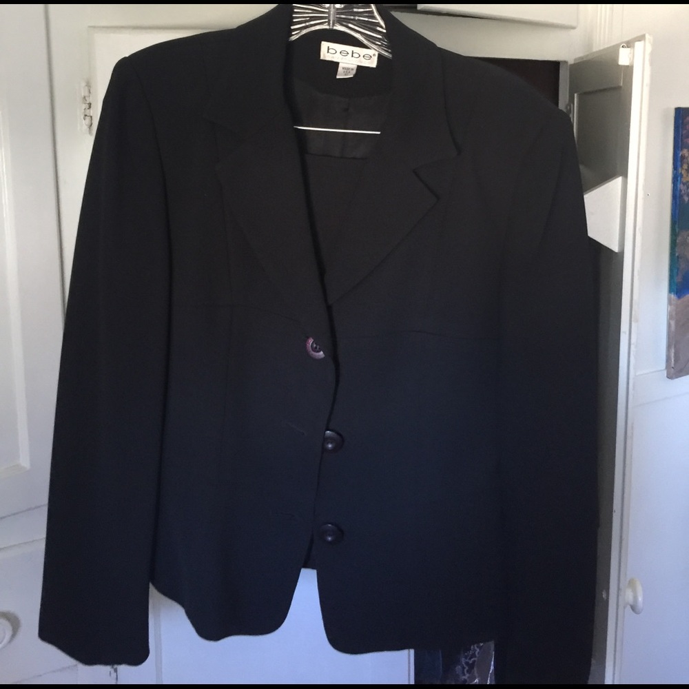 Black skirted suit