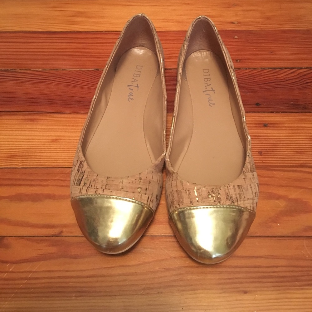 Flats with gold toe, cork with gold accent.