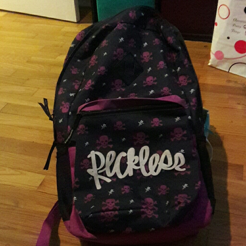 Young and reckless bookbag