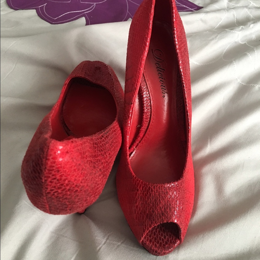 Red snakeskin heels