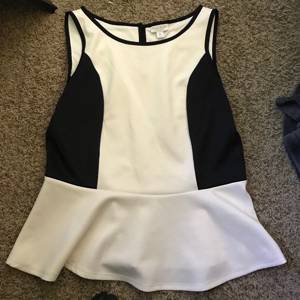 Black and white sleeveless peplum top