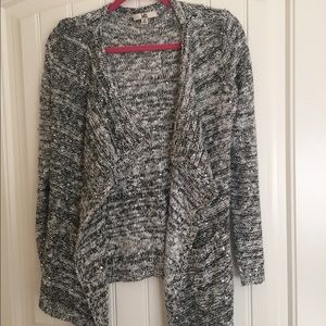 Black and white sequin sweater with waist tie