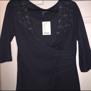 Anthropology knit top! Stylish, unique detailing.