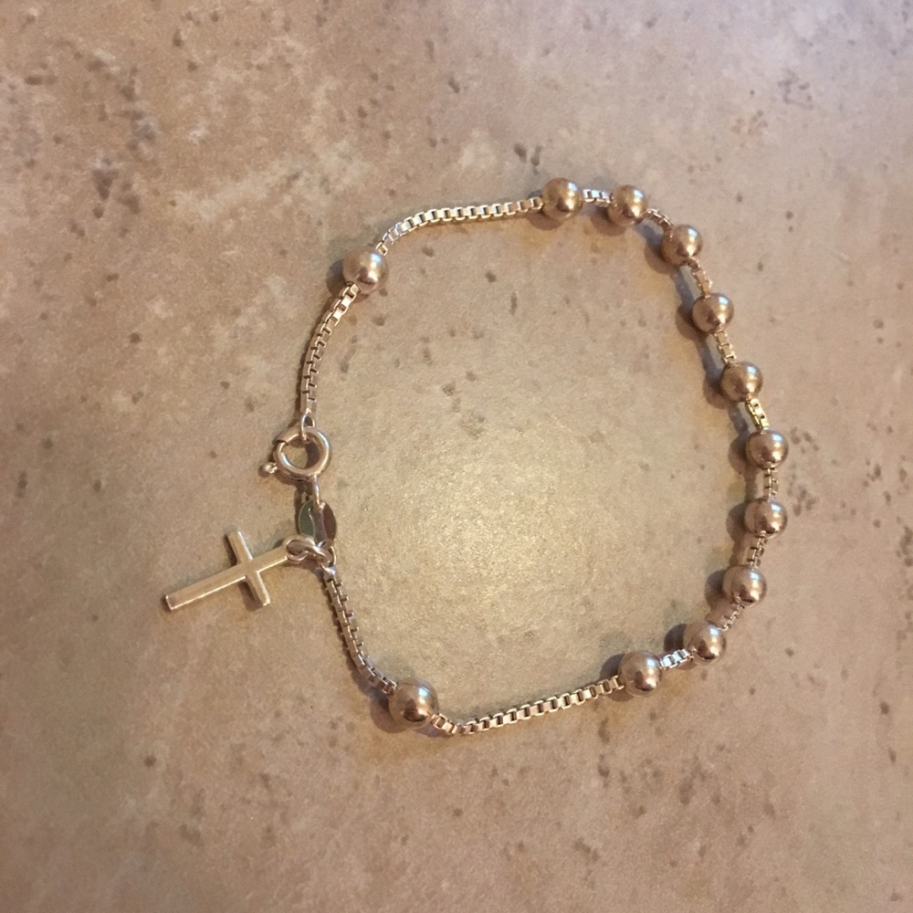 Silver bracelet with cross