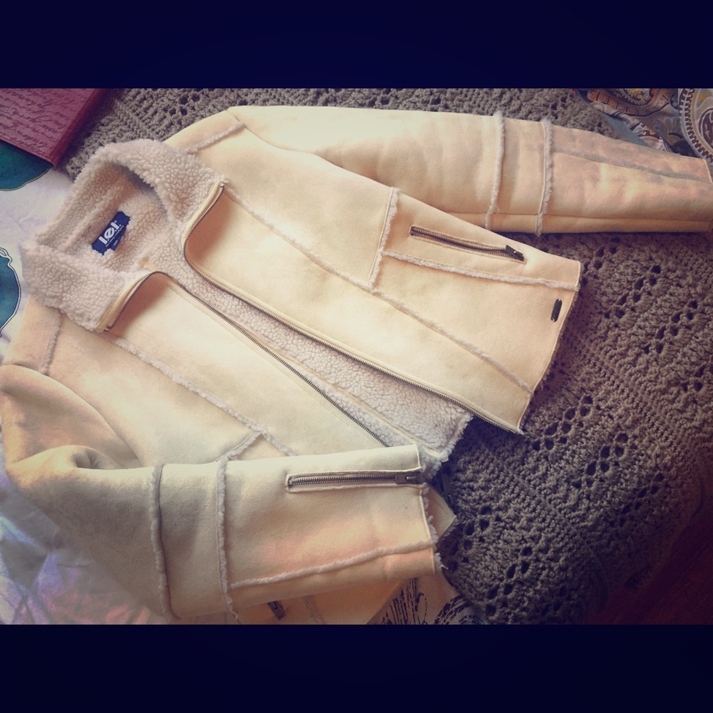 Faux suede and Sherpa zip up coat.